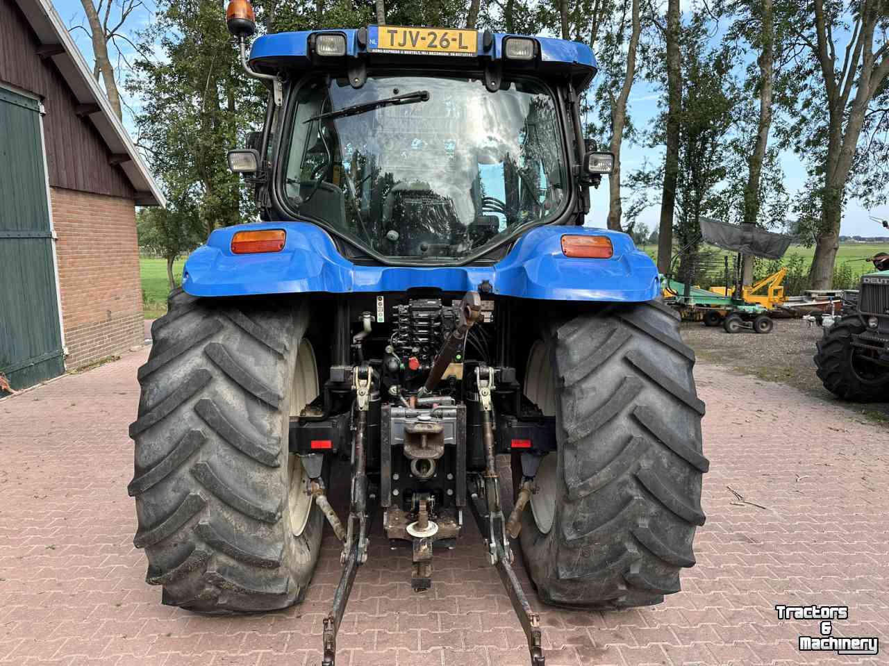 Traktoren New Holland TS100A met voorlader