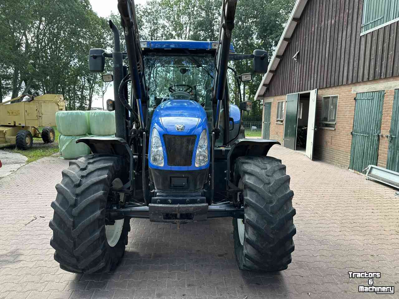 Traktoren New Holland TS100A met voorlader