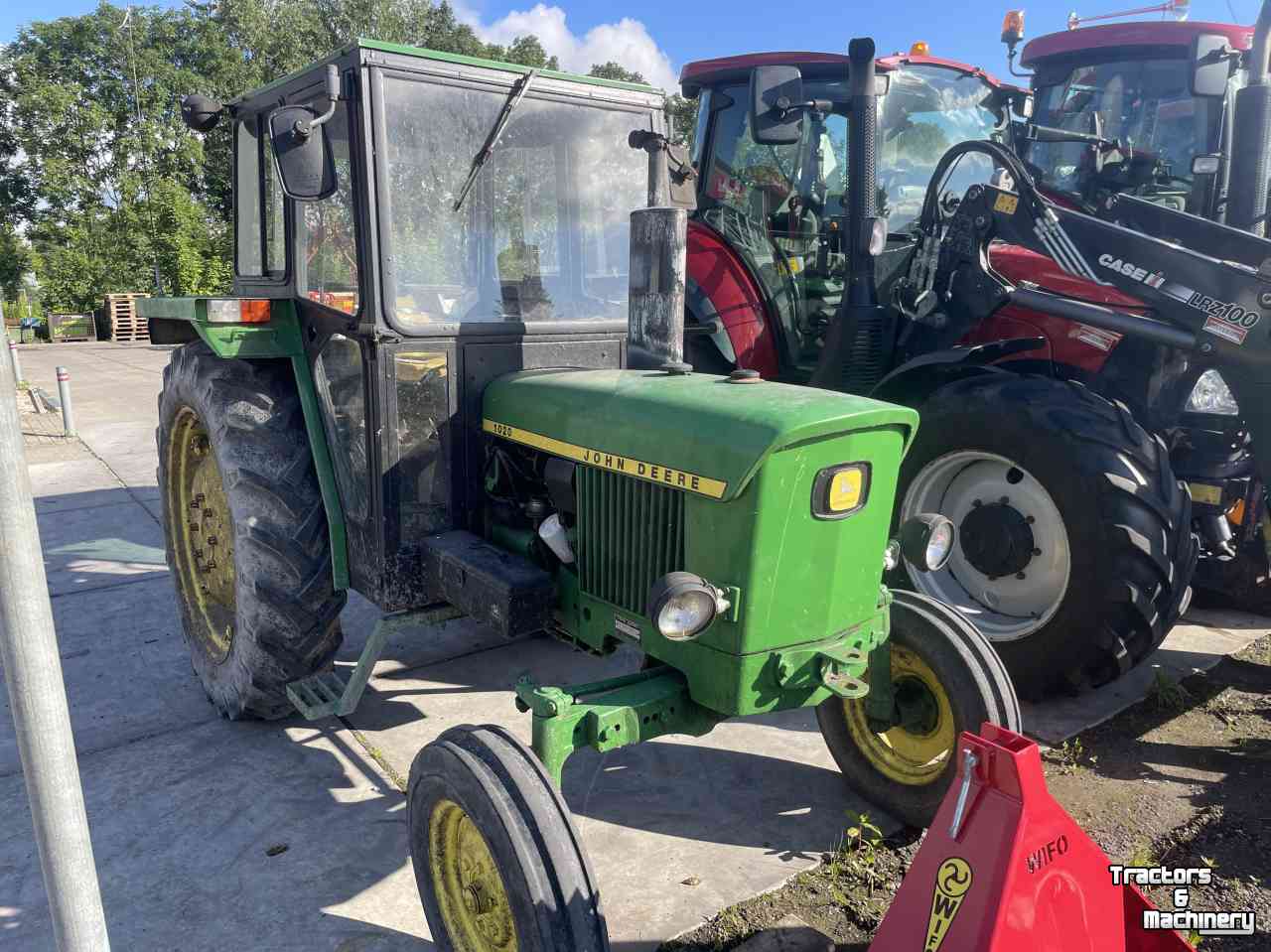 Traktoren John Deere 1020 met cabine